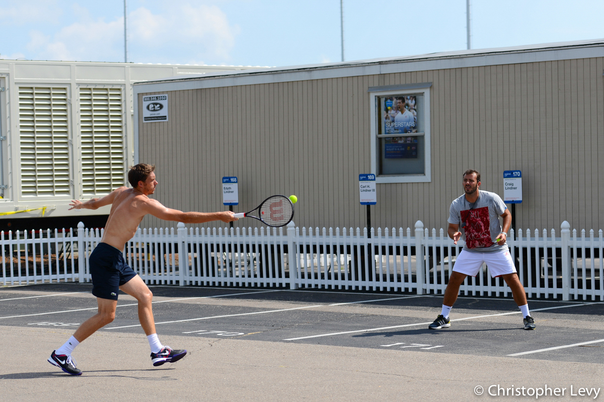 Nicolas Mahut practicing tennis in a parking lot in Cincinnati