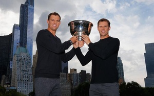 Bryan Brothers holding tennis trophy